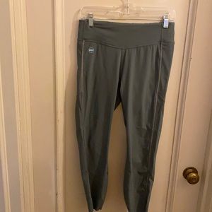 Janji workout pants in olive green.